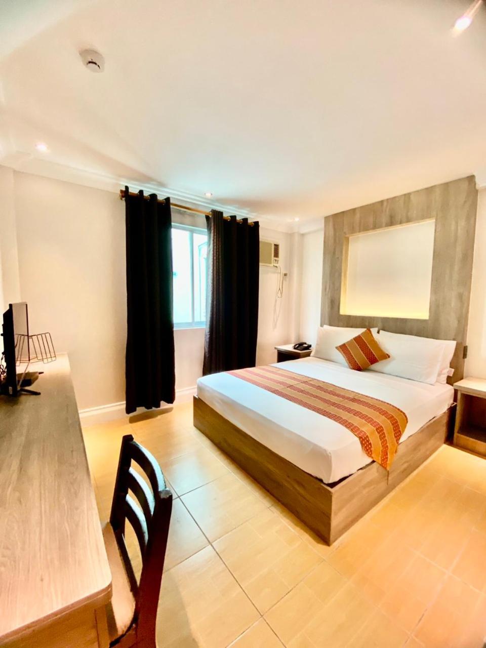 Hotel Euroasia By Bluebookers Angeles Exterior photo