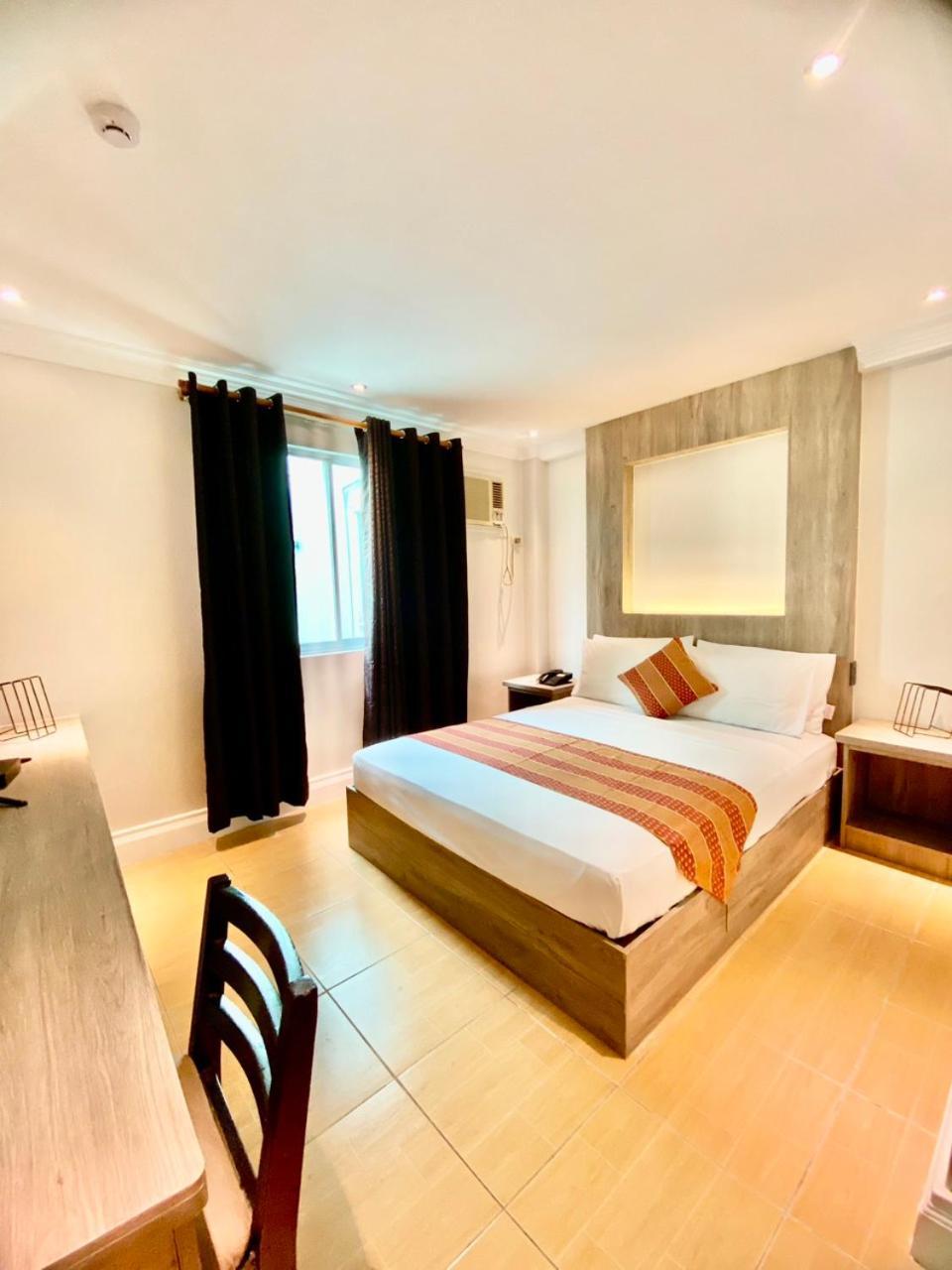 Hotel Euroasia By Bluebookers Angeles Exterior photo